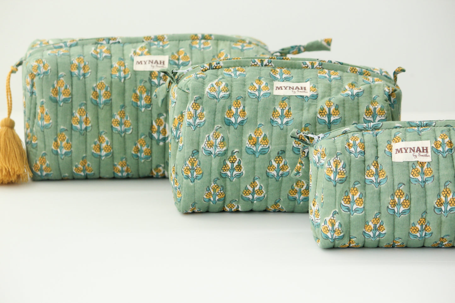 'OCHRE MOTIF' printed travel/makeup zipper pouch-set of 3