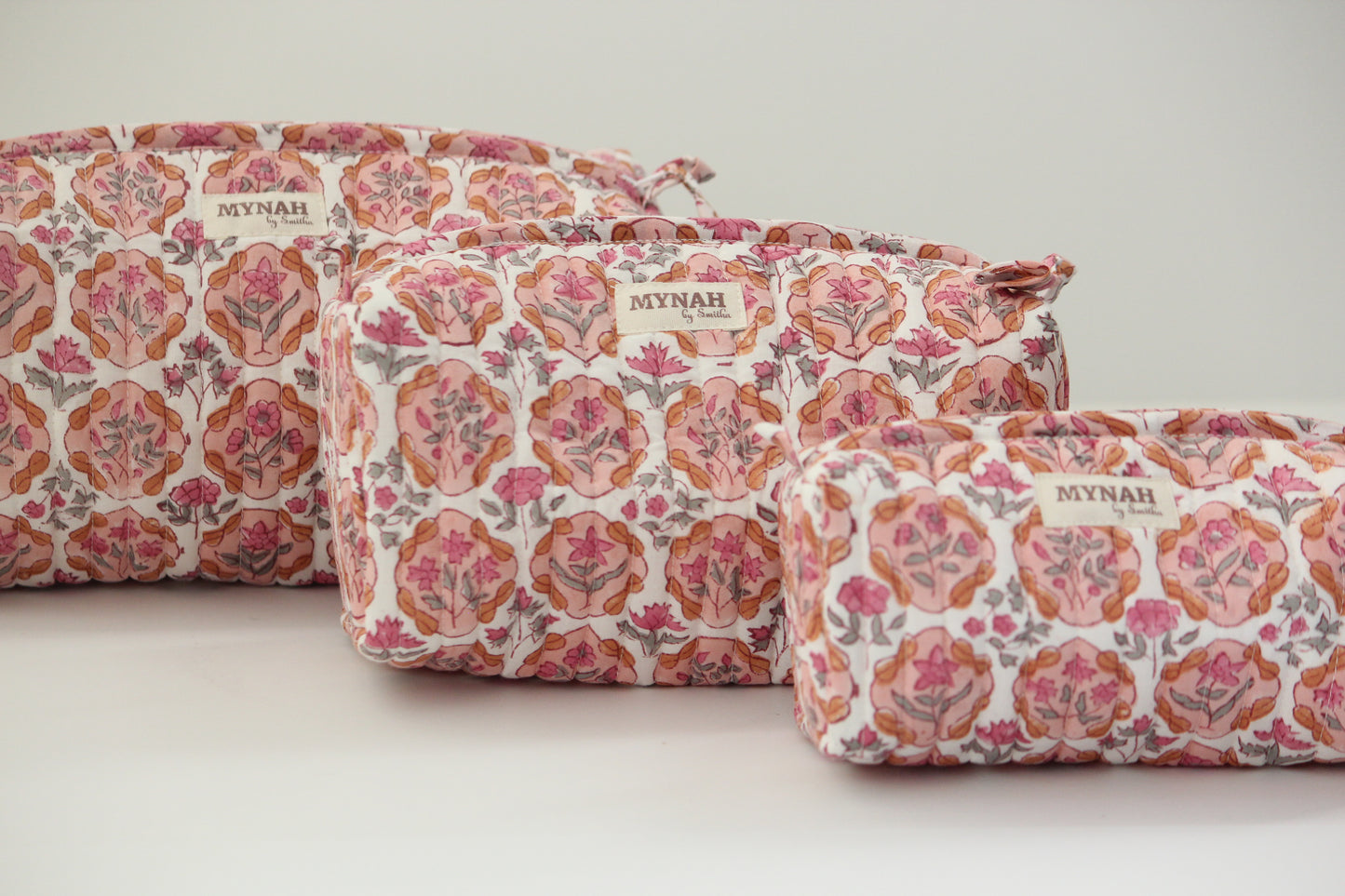 'APRICOT BLUSH' printed travel/makeup zipper pouch-set of 3